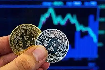 A mining farm with rows of miners signifies a lower energy rate